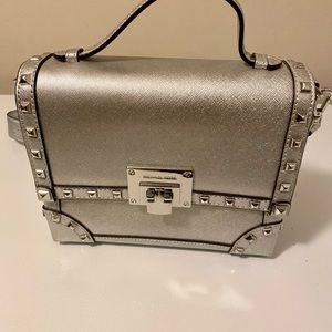 BRAND NEW Silver/Pewter Michael Kors purse.
